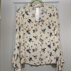 Bell long sleeve blouse with flowers on it